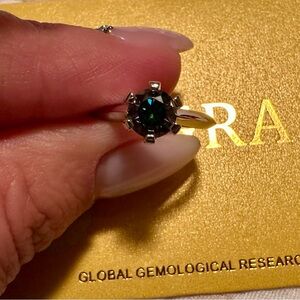 White gold plated ring with genuine moissanite